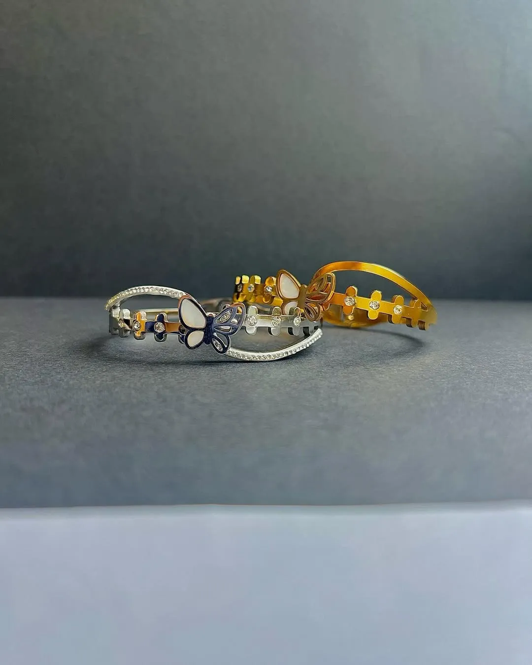 Butterfly motif bangles