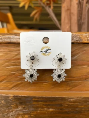 Silver hoop earrings with deep blue stones