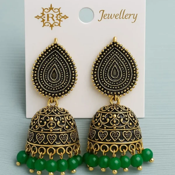 Antique gold jhumka earrings with intricate detailing