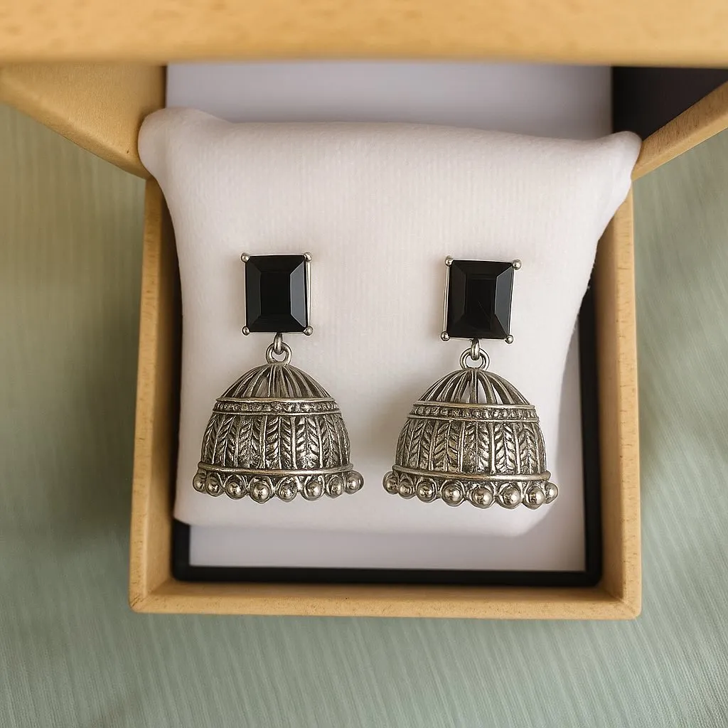 Antique silver jhumkas with bold black studs